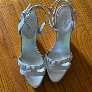 Guess plataform sandals white and silver color. Worn once, like new.
